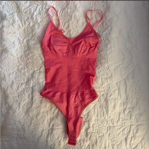 Brand New! PINK seamless body suit Size XS